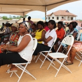 Hon. Gambrah cuts sod for the construction of six unit block for the Aprade MA school