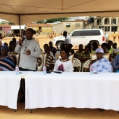 Hon. Gambrah cuts sod for the construction of six unit block for the Aprade MA school