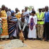 Hon. Gambrah cuts sod for the construction of six unit block for the Aprade MA school