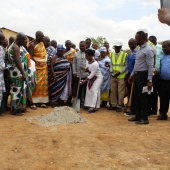 Hon. Gambrah cuts sod for the construction of six unit block for the Aprade MA school