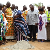 Hon. Gambrah cuts sod for the construction of six unit block for the Aprade MA school